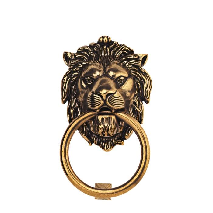 Antique brass lion head door knocker with ring. Home decor accent.